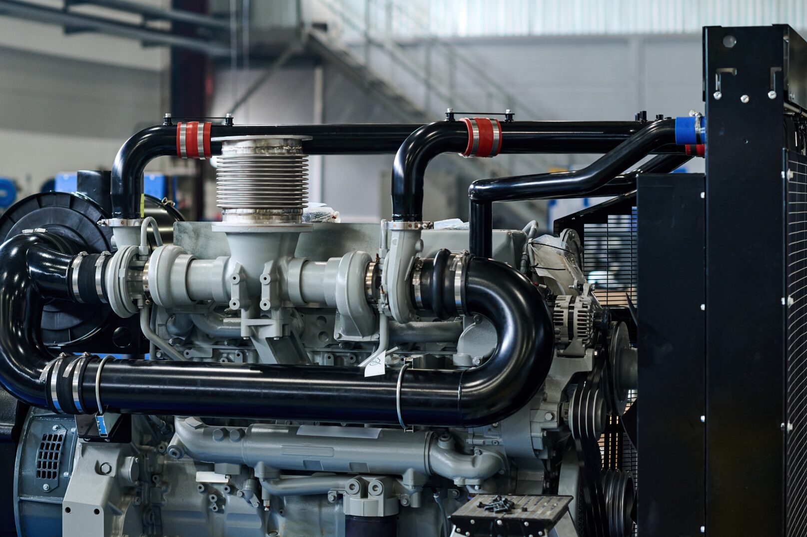 Large diesel generator engine with glossy pipes